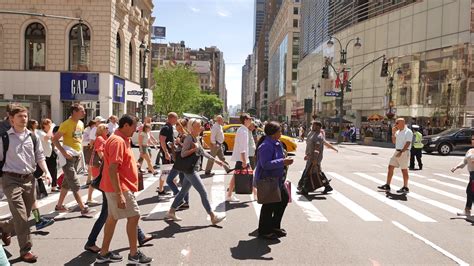 diverse people crossing street   york city stock video footage