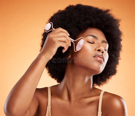 Beauty Afro And Black Woman With Skincare Derma Roller For Healthy And