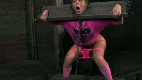 White Skank Chastity Lynn Is Fixed In The Pillory And