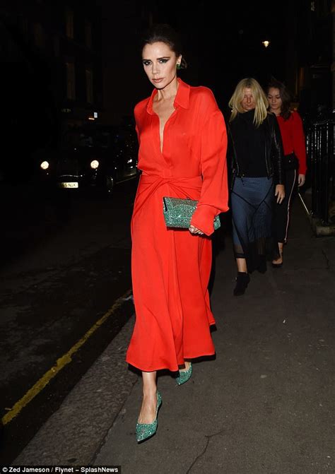 victoria beckham dons silky red dress at vogue london bash daily mail