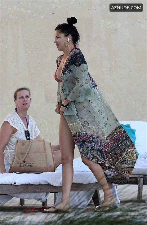 adriana lima shows off her bikini body at the pool in miami aznude
