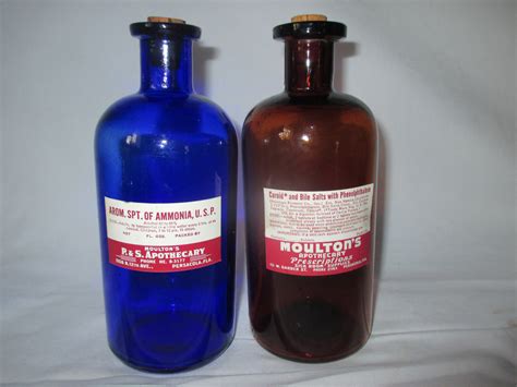 antique moultons pharmacy amber glass corked bottles apothecary jars