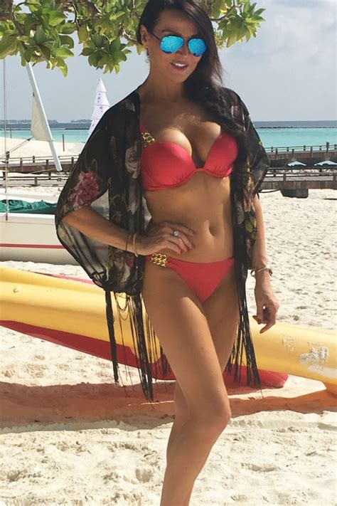 lizzie cundy shows off her incredible body as she spends christmas in bright red bikini ok