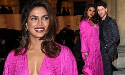priyanka chopra flashes her cleavage in a plunging magenta look as she