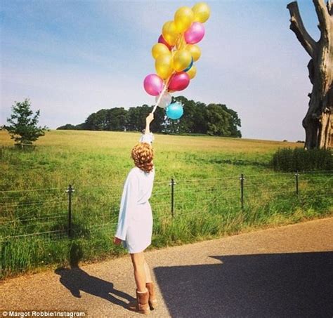 margot robbie showered with colourful balloons on 24th birthday daily mail online