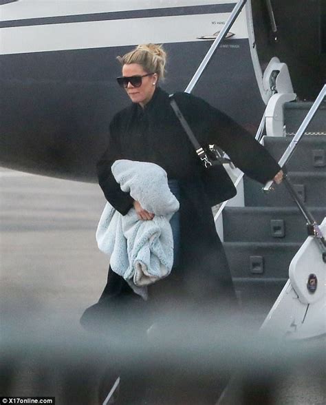 pregnant khloe kardashian hides stomach with a blanket daily mail online