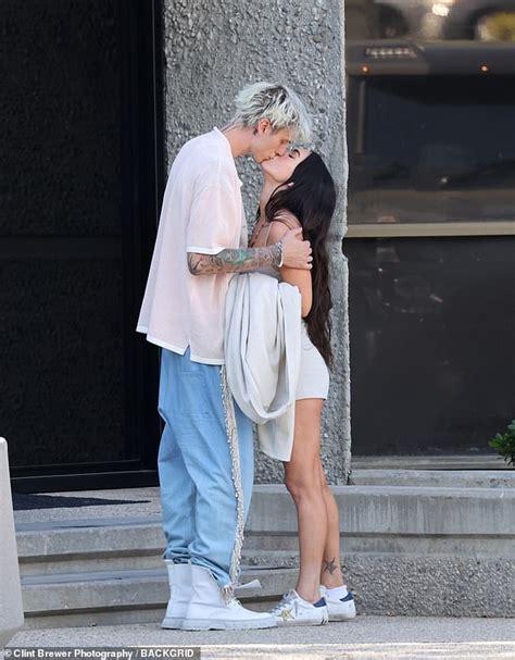 megan fox and machine gun kelly pack on the pda with kisses after being