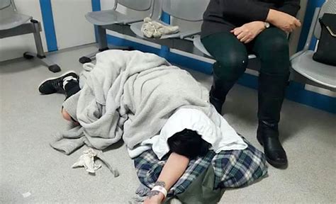 Shocking Pictures Of 22 Year Old Woman Lying In Agony On Hospital Floor