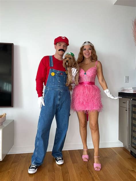 a man and woman dressed up in costumes