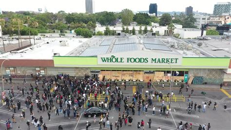 drone footage shows los angeles protest  george floyd dissolve  looting   foods market