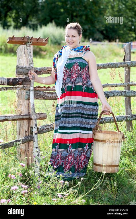 Country Lifestyle In Village Woman In Dress Russian People In Rural