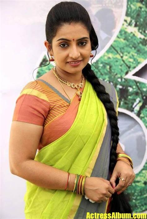 Telugu Tv Actress Sujitha Photos In Yellow Saree Actress