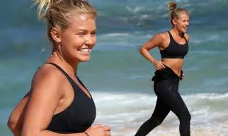 Lara Bingle Shows Off Her Toned And Tanned Abs As She Keeps Fit By