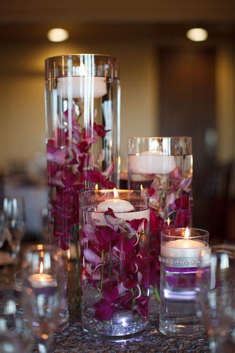 Purple Orchid And Floating Candle Centerpieces Floating Candle