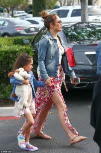 jennifer lopez flashes her famous legs in floral maxi skirt daily mail online