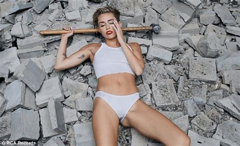 miley cyrus gets fully naked to straddle wrecking ball in video of the same name daily mail online