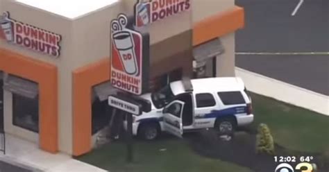 Watch Police Officer Drive Into Dunkin Donuts Literally World News