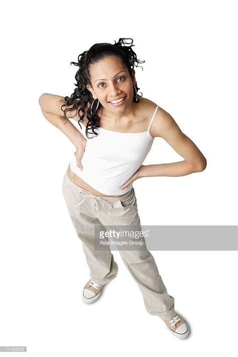 Woman Looking At Camera Smiling Hands On Hip Figure Poses Female