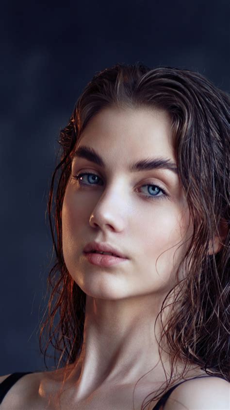 download wallpaper 540x960 blue eyes girl model portrait 2021