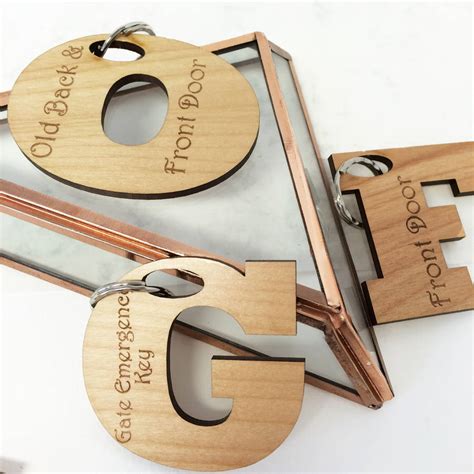 personalised initial letter key ring  hickory dickory designs