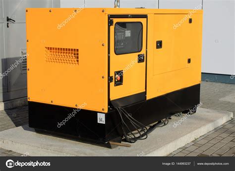 yellow auxiliary diesel generator  emergency electric power stock photo  miroslav
