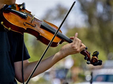 violinist playing outdoors  stock photo public domain pictures