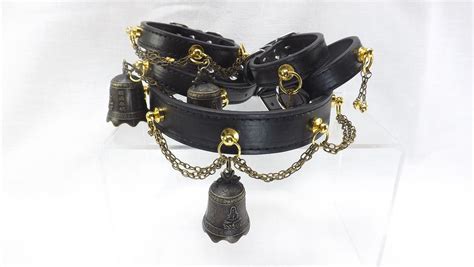 slave collar and cuffs set black leather with large gold