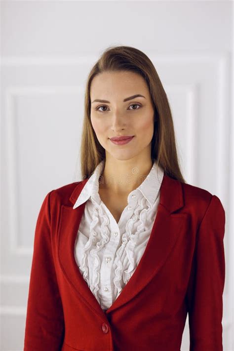 business woman  red standing  modern office headshot   young