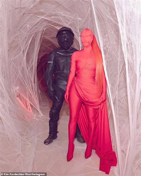 Kim Kardashian Shares Snaps Of Her Red Sandm Bondage Suit From Halloween