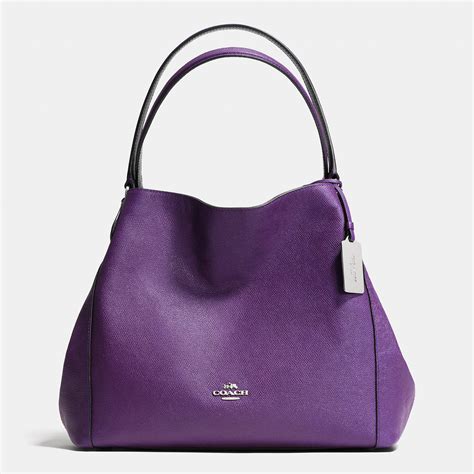 coach edie  shoulder bag  pebble leather  purple lyst