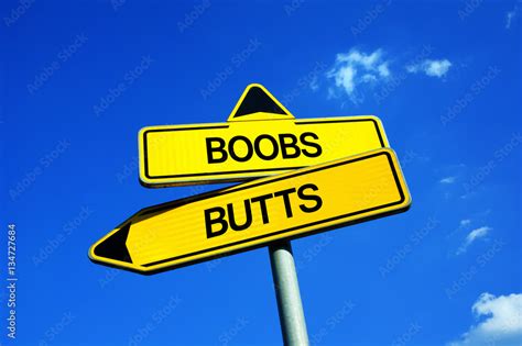 boobs vs butts traffic sign with two options metaphor of dilemma