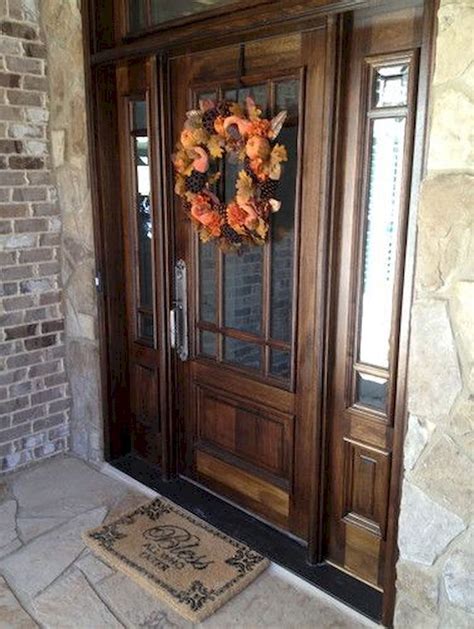 door   wreath      mat  front   door