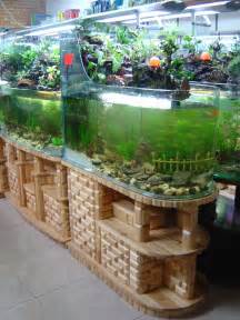 Feng Shui corner and room divider glass aquariums, with brick style 