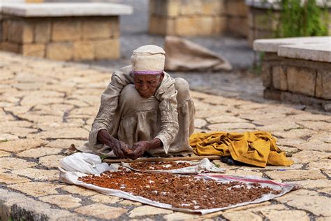 beggar woman on the street aksum ethiopia africa photograph by artush