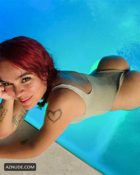 Karol G In Swimsuit Flaunting Her Stunning Ass In The Pool For Her Fans