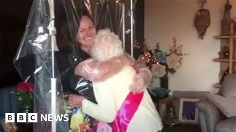 Grandma’s First Hug In Six Months Through ‘cuddle Curtain’ Bbc News