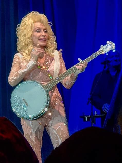 Dolly Parton Adds Flash And Sex Appeal To A Pure And Simple
