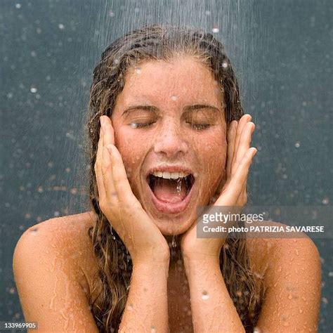 Woman Wet Hair Shower Photos And Premium High Res Pictures Getty Images