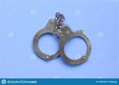 bdsm and sex games concept handcuffs on blue background stock image image of cuff bondage