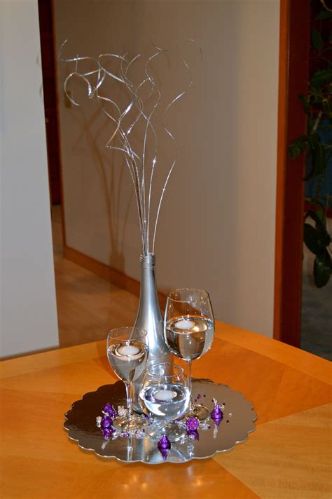 Centerpiece Made From Painted Wine Bottle Assorted Wine Glasses And