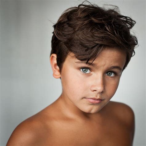 close  boy  tanned skin  blue eyes photo  benedicte brocard