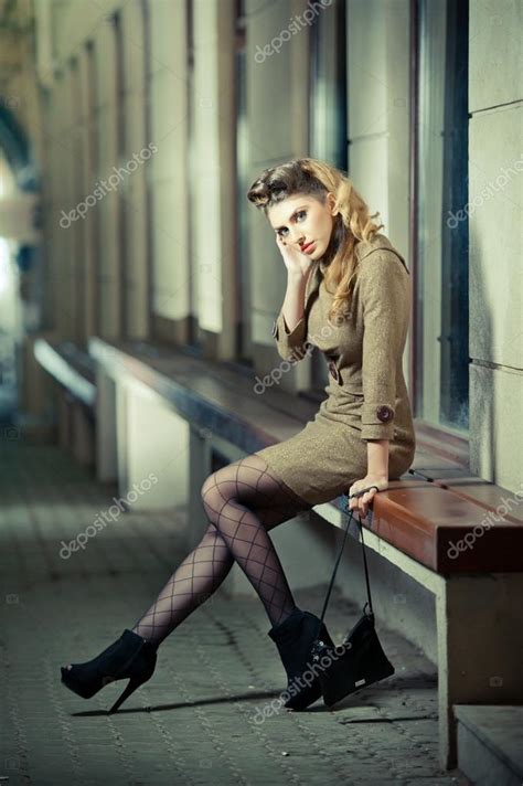 Attractive Blonde Girl Wearing Short Dress And High Heels Urban Scene