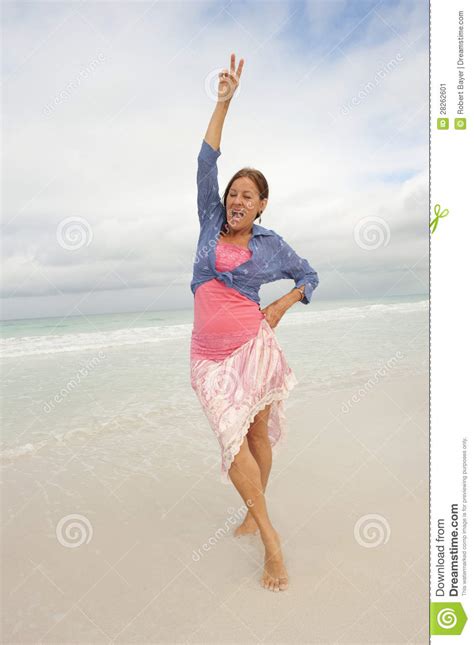 cheerful sexy mature woman beach holiday stock image image 28262601