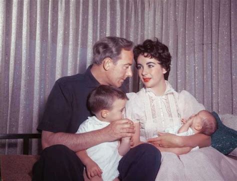 Married Actors Michael Wilding And Elizabeth Taylor Sit