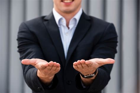 Free Photo Businessman Holding His Hands Out