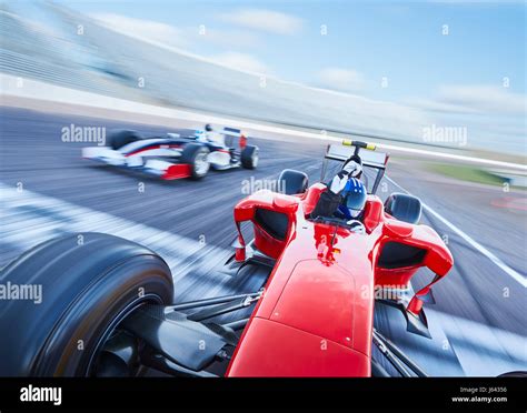 formula  race car crossing finish   sports track stock photo