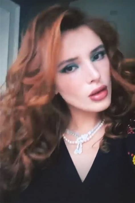 bella thorne puts on an eye popping display in satin lingerie as she