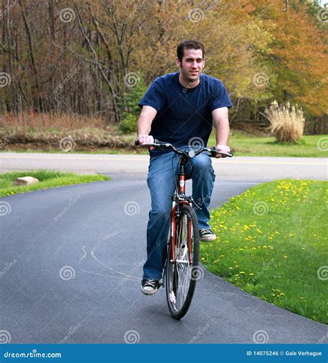 man riding bicycle stock photo image  person pleasurable