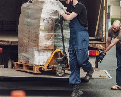 workers  unloading  supply  goods   supermarket editorial stock photo image
