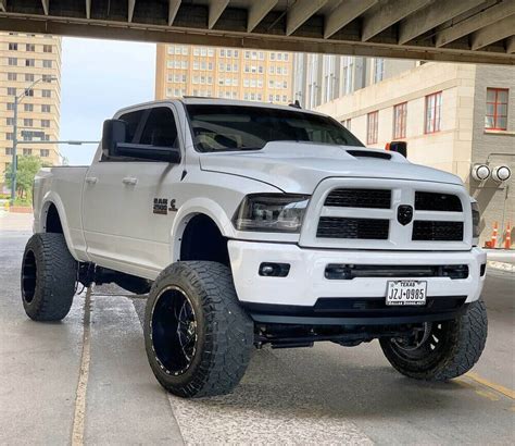 meet  white ghost lifted  dodge ram  laramie